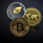 A striking image of Bitcoin, Ethereum, and Ripple coins illustrating modern digital currency.